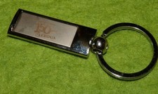 Beau porte clés en acier poli 150 ans chicorée Leroux  Keyring Schlüsselring 