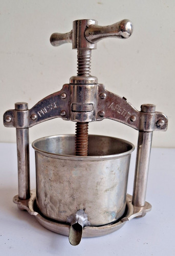 Ancienne presse jus avec - presse,