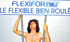 Carton PUBLICITAIRE  "Flexifort"  Superbe  exemple de pub sexiste des années 60.