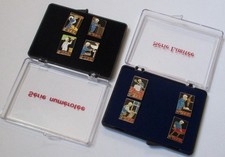 lot de 2 coffrets de 4 pin's