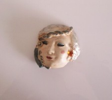 Tres joli masque art déco en