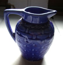 Pot à lait ancien en faïence