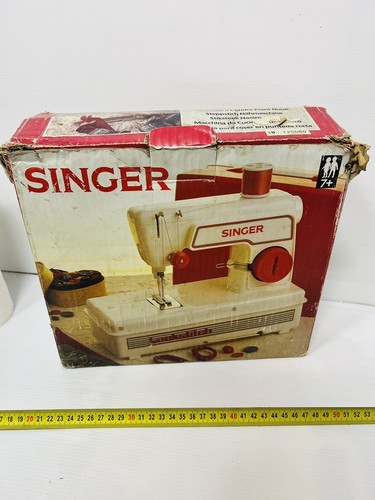 Singer machine couture - À,