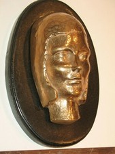 Visage féminin sculpture art