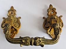 Poignée bronze pour meuble ou piano