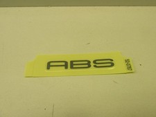 Emblème gauche garde boue