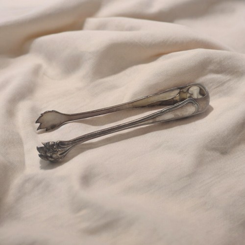 Une pince sucre christofle - pince,