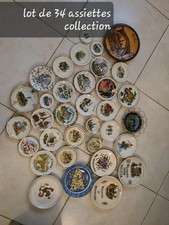 assiettes décoratives porcelaines - un lot de 34 assiettes avec des supports - b