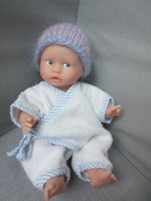 Poupon mini  corolle 20 cm tout vinyle .