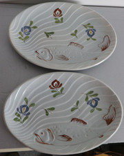 2 plats ovales avec decor de