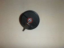 BOUCHON ANTIVOL ETAT NEUF AVEC 2 CLES diamètre 40 longueur des ergots 48mms