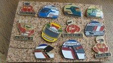 LOT 11 PIN S CASQUES AUTO F1