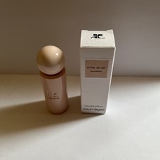 COURREGES MINIATURE EN 5 ML DE LA FILLE DE L AIR PLEINE AVEC SA BOITE .