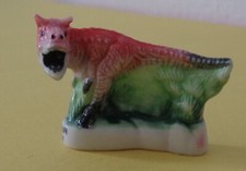 Fève thème Animaux Film Disney Carnotaur Dinosaure  réf 1258