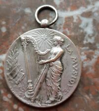 Ancienne médaille en bronze argenté  "La Musique" par F. RASUMNY Périgueux 1906
