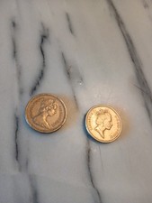 one pound 1983 Et 1985