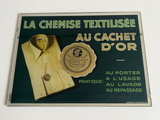 Ancienne PLV type fixé sous verre Gerrer "chemise textilisée au cachet d'or"