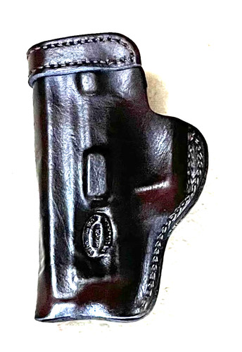 Pre owned leather pistol
