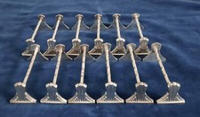 12 porte-couteaux métal argenté Art Déco