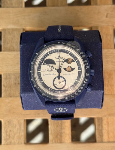 Swatch omega mission - swatch,