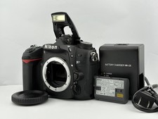 Boîtier Nikon NIKON D7000 "Fonctionne très bien" avec batterie et chargeur...