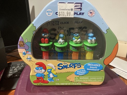 Pez the smurfs click - click, play