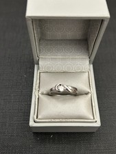 belle bague argent massif avec pierre blanc