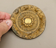 Embrasse de rideaux en laiton.