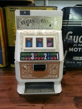 "TOY SLOT MACHINE BY POYNTER