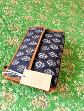 Grande Pochette Sessùn, En