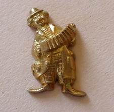 Fève en métal doré - Le