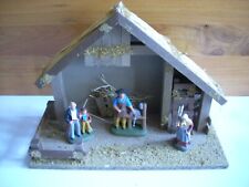 Maison en bois pour village de Noël accompagné de 3 personnages en terre cuite