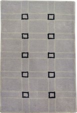 Tapis touffeté à la main de