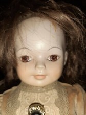  Poupée avec tête, mains et