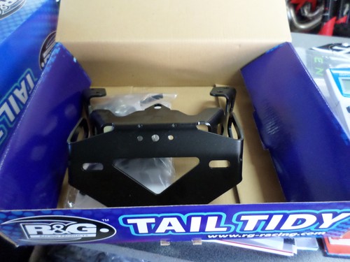 Support plaque tail tidy - tail,