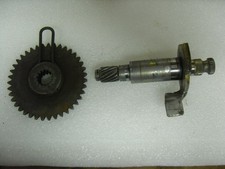 Axe et pignon lanceur de