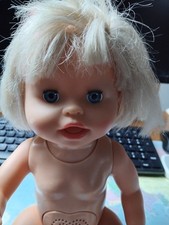 poupée parlante parfait état