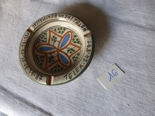 ancien cendrier pub terre