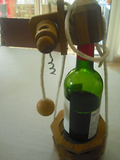 Porte bouteille-casse tête bois et tire-bouchon