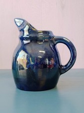 Pichet en grès flammes