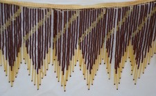 Franges de perles en verre marron et tubes dorés