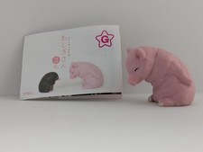 Figurine cochon arcant merci