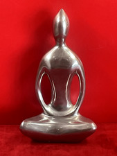 bouddha aluminium poli désign moderne au visage sans trait H 26 cm