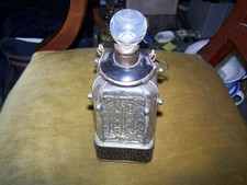 ancienne bouteille a Whisky en verre avec mécanisme musicale