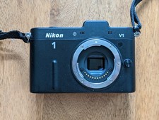 Nikon 1 V1 + objectif 30-110 et accessoires