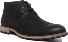 JUSTINREESS ENGLAND Cuir