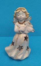 Ange en céramique, musicien