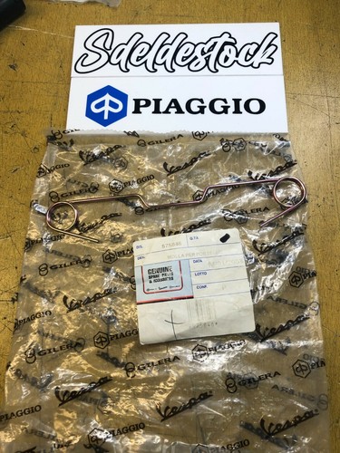 Ressort coffre avant piaggio - 1,