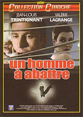 Homme abattre - un,