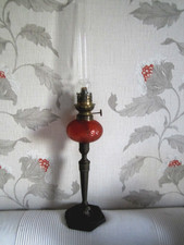 Ancienne lampe à pétrole toupie de piano réservoir verre orange pied Bronze 57cm